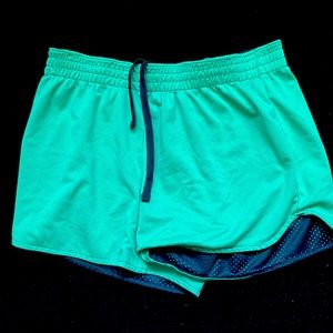 Two way reversible shorts can be worn blue or green very comfortable worn once
